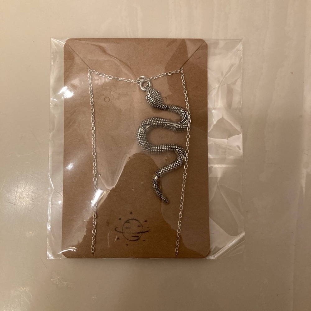 Brand new silver snake necklace